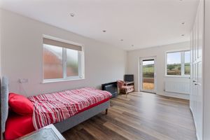 Bedroom One- click for photo gallery